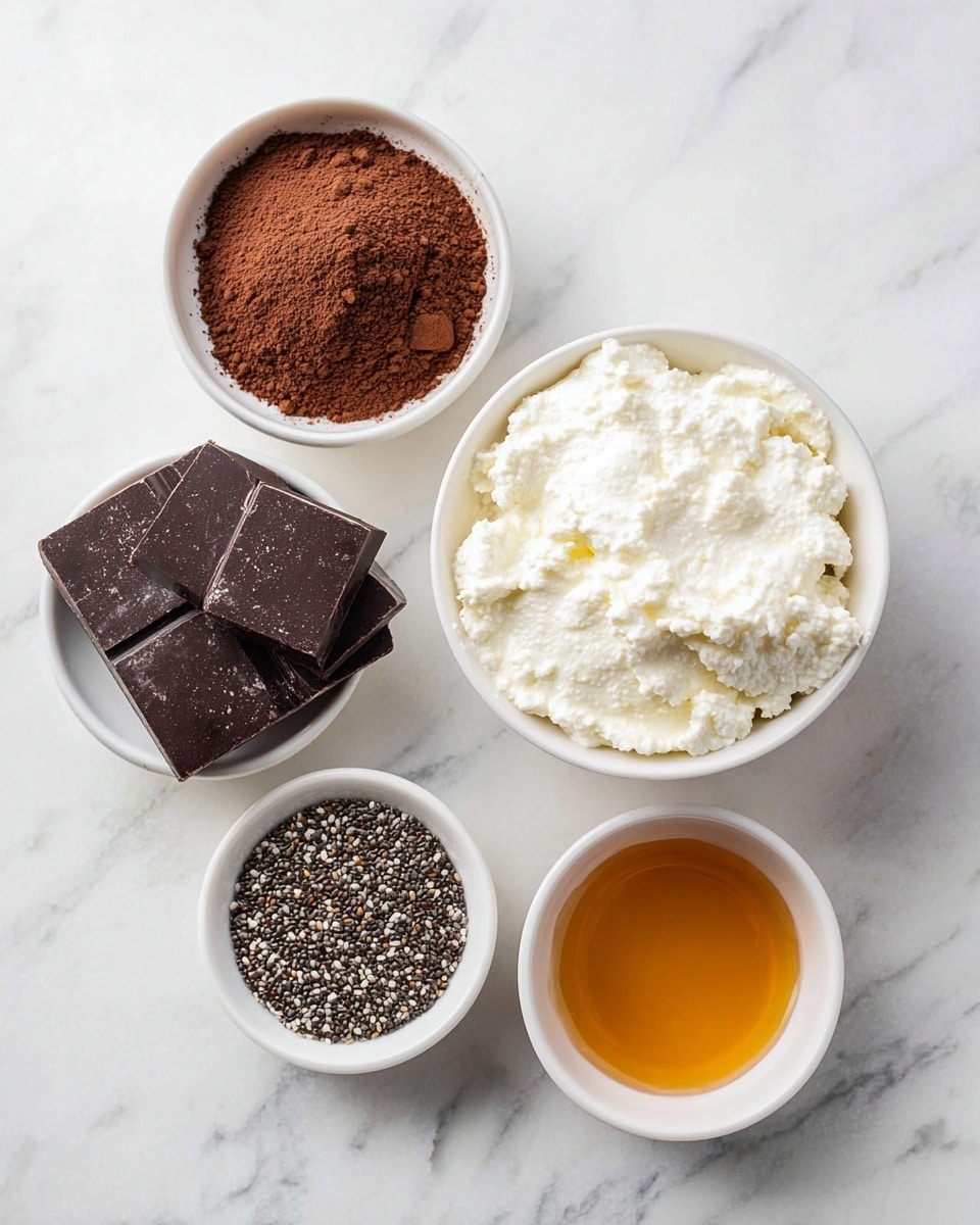 The image shows five small white bowls placed on a white marbled surface. The top right bowl is filled with thick, creamy white cottage cheese with a slightly lumpy texture. To its left, a bowl holds fine, dark brown cocoa powder with a smooth surface and a few clumps. Below the cocoa powder, another bowl contains three large dark chocolate pieces that have a matte finish and some powdery marks. To the right of the chocolate pieces, a small bowl is filled with dark chia seeds, shiny and tiny with a mix of black and white colors. The final bowl, placed at the bottom right, contains golden amber honey, smooth and glossy with a slight reflection on the surface. photo taken with an iphone --ar 4:5 --v 7