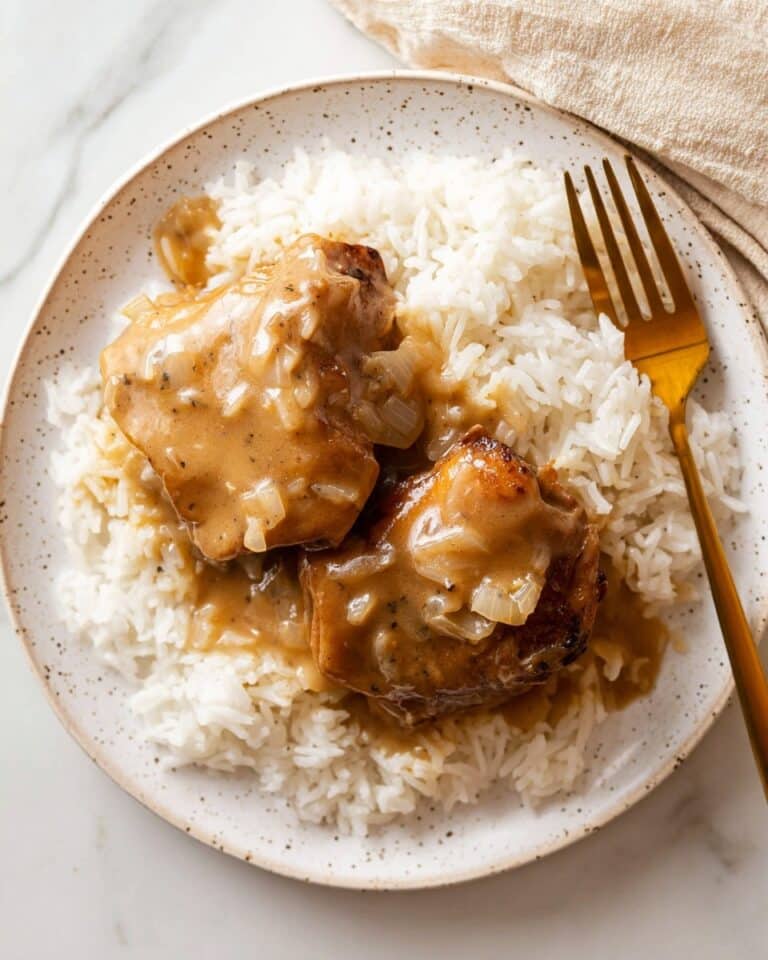 Southern Smothered Chicken Thighs with Gravy and Rice Recipe