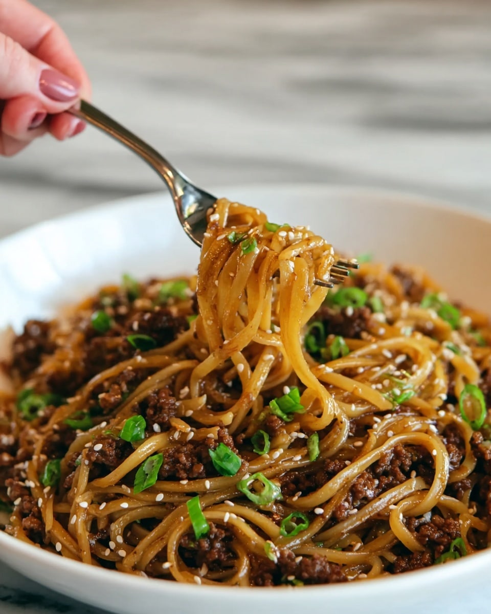 A white bowl filled with a pile of thin, yellowish-brown noodles mixed with dark brown minced meat. The noodles and meat are coated in a shiny sauce. On top, there is a sprinkle of small green chopped scallions and tiny white sesame seeds. The bowl sits on a dark wooden surface with a hint of green onions in the background. photo taken with an iphone --ar 4:5 --v 7