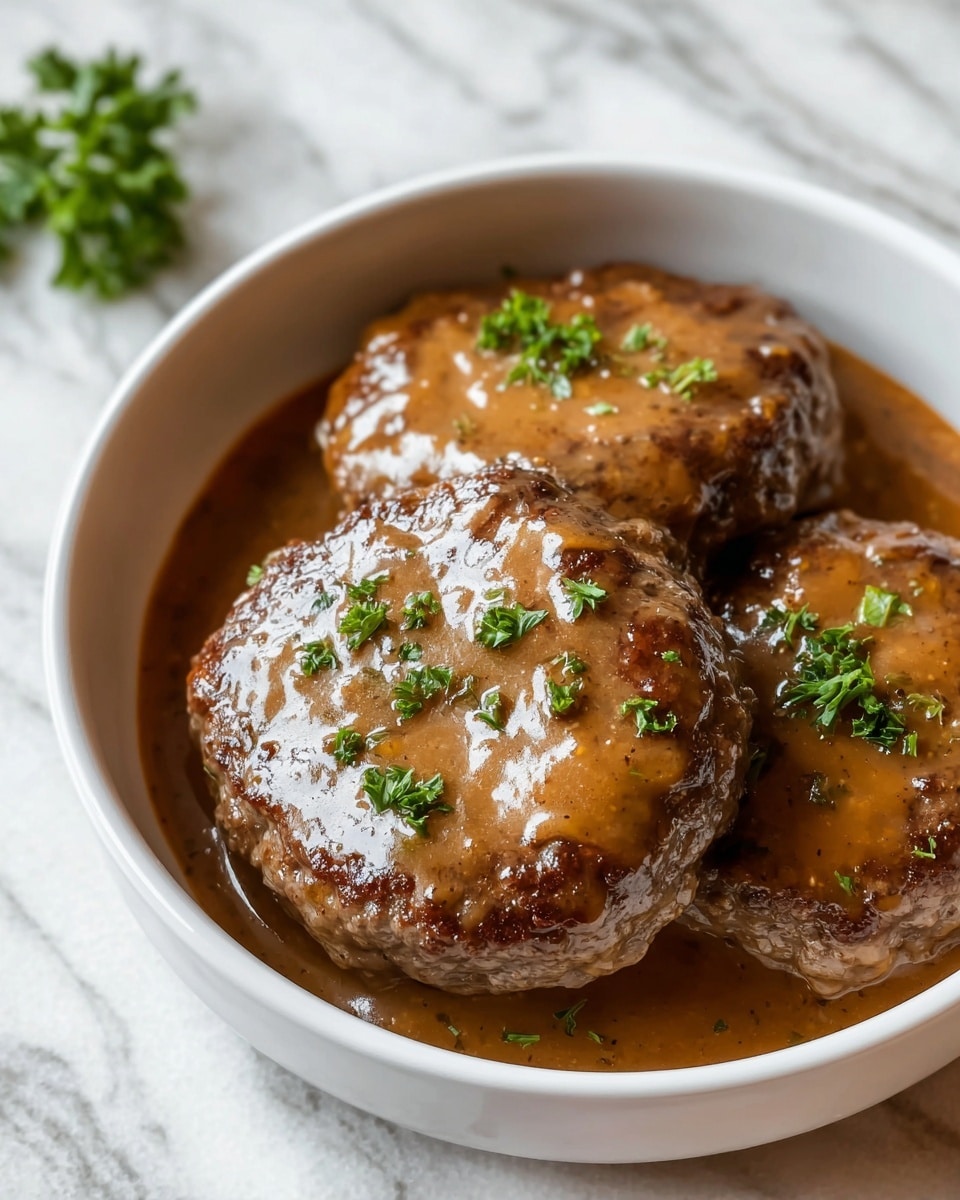 The image shows three thick brown patties covered with a light brown sauce inside a white bowl. Each patty is topped with small green parsley pieces, adding a touch of color. The surface of the patties looks moist and shiny from the sauce, and the bowl sits on a white marbled texture. Photo taken with an iphone --ar 4:5 --v 7