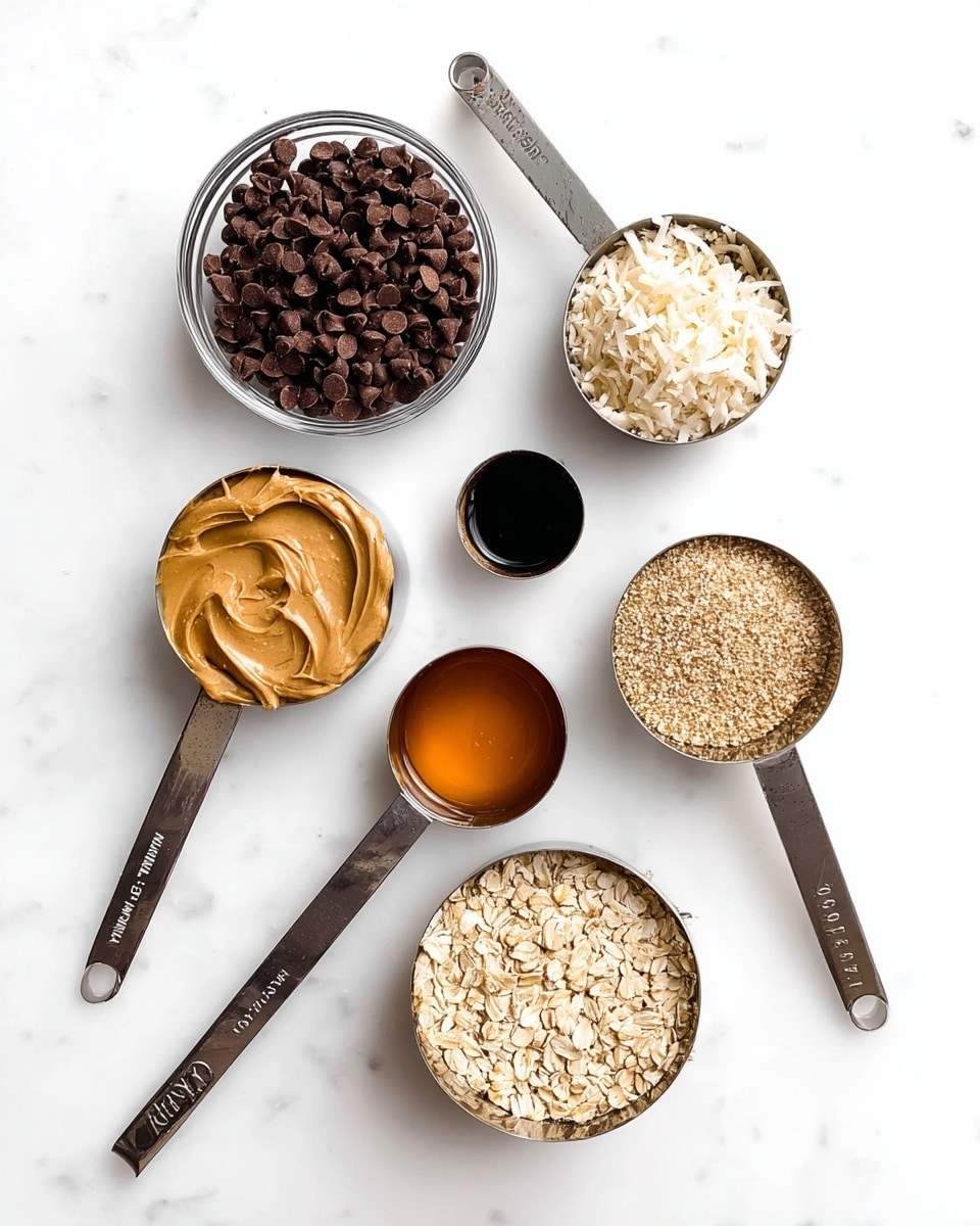 The image shows seven measuring cups and bowls filled with different ingredients arranged on a white marbled surface. Starting from the top left, there is a glass bowl filled with dark brown chocolate chips, next to it on the right is a metal 1-cup measuring cup filled with toasted shredded coconut, below that to the right is a small metal 1 tablespoon spoon with dark vanilla extract, and below that to the left is a metal 1/2 cup spoon holding smooth golden peanut butter with a slight swirl texture. At the bottom left of the image is a metal 1/3 cup measuring cup filled with rolled oats that have a pale beige color, and in the center is a metal 1/2 cup measuring cup filled with ground flaxseed, which is light brown and grainy. To the left of the flaxseed is a metal 1/3 cup measuring cup filled with a shiny amber liquid, likely honey or syrup. The tools and ingredients are neatly spaced out, all placed on the clean white marbled surface. Photo taken with an iphone --ar 4:5 --v 7
