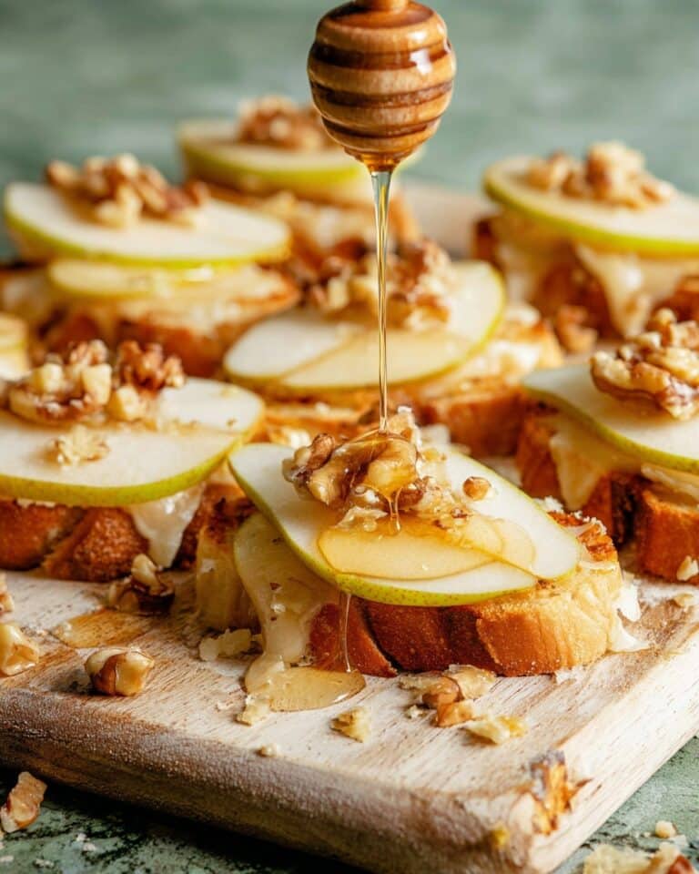 Parmesan Crusted Crostini with Pear, Walnuts & Hot Honey Recipe