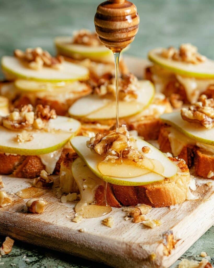 Parmesan Crusted Crostini with Pear, Walnuts & Hot Honey Recipe