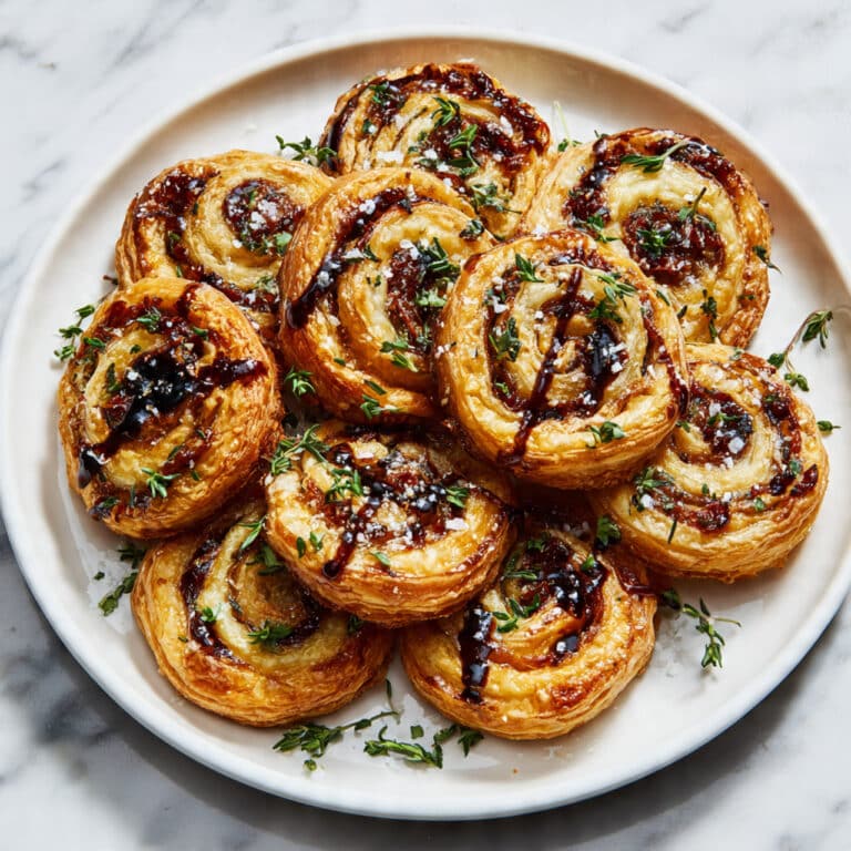Cheesy Caramelized Onion Puff Pastry Pinwheels Recipe