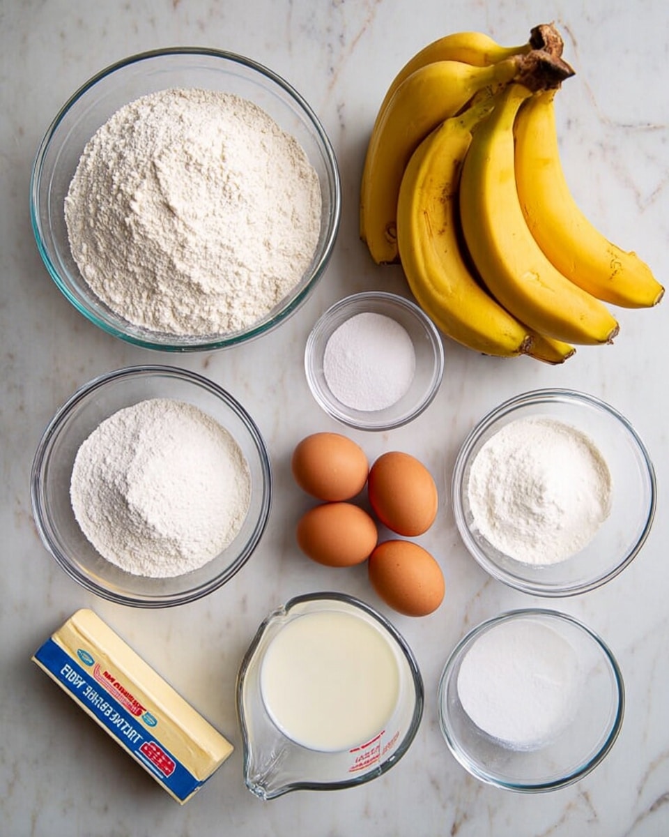 The image shows a flat lay of ingredients for baking on a white marbled surface. There are eight clear glass bowls with different contents arranged neatly: a large bowl with white flour on the top left, a medium bowl filled with white sugar in the center, a smaller bowl with white powder (baking powder) below the sugar, a small bowl with white salt on the top right, and a bowl holding three brown eggs near the upper center. Nearby is a white glass measuring cup with a small amount of milk on the bottom left. Above the eggs sits a bunch of yellow bananas with slight brown spots on their peel, and two sticks of light yellow butter with colorful wrappers are placed horizontally between the eggs and flour. The whole scene is bright with natural light. Photo taken with an iphone --ar 4:5 --v 7