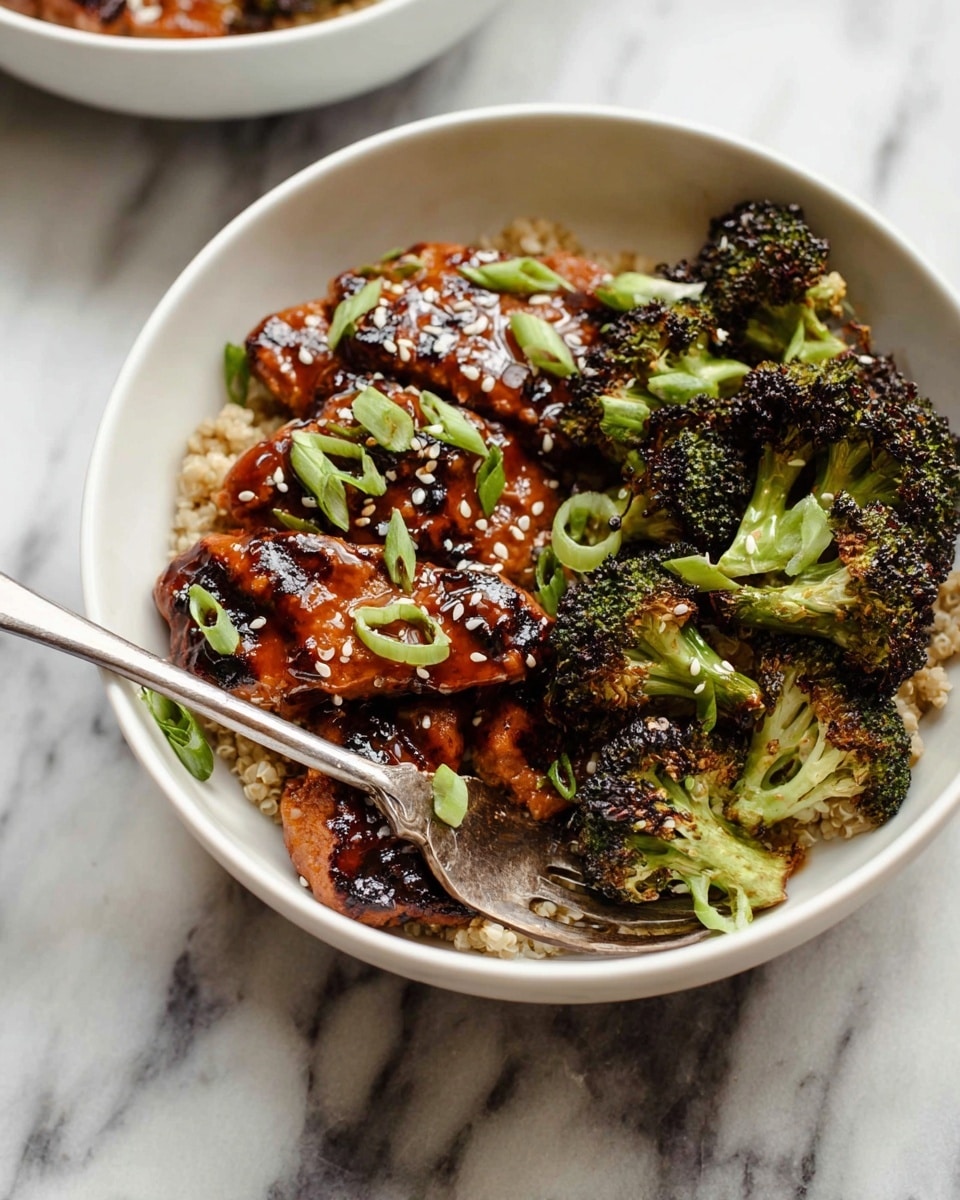 The image shows a white bowl filled with two main layers: the bottom layer is a bed of cooked grains with a light brown color and slightly coarse texture, and on top there are pieces of grilled meat coated in a shiny reddish-brown sauce with visible grill marks, arranged alongside small, charred broccoli florets that are bright green with some dark browned edges. The dish is sprinkled with white sesame seeds and garnished with sliced green onions, adding a fresh green touch. A silver fork is placed inside the bowl, resting on the food, and the bowl sits on a white marbled surface. Photo taken with an iphone --ar 4:5 --v 7