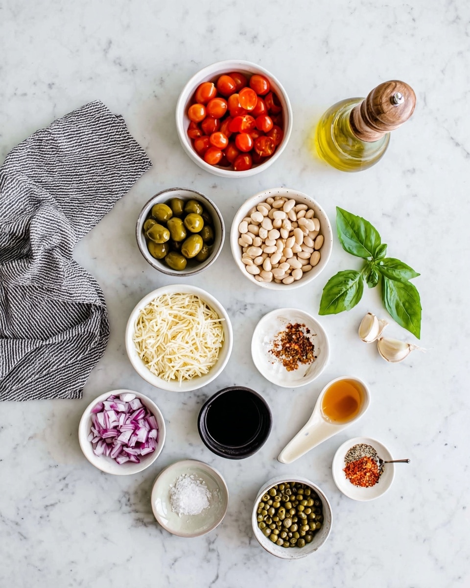 The image shows various ingredients laid out on a white marbled surface. There are eleven small white bowls arranged in a loose circular pattern. Starting near the top, a bowl of bright red cherry tomatoes sits next to a bowl of light green sliced olives. Below is a larger bowl filled with white beans. Another bowl contains pale yellow shredded cheese. Nearby is a small black cup with dark balsamic vinegar. There is a small bowl with green basil leaves and a small bowl filled with green capers. Also present is a small bowl of diced purple onions and a small white dish holding two cloves of garlic. Additionally, there is a small bowl of amber-colored vinegar and a small bowl of red pepper flakes with a tiny wooden spoon. Near a white spoon filled with salt, a glass bottle of golden olive oil stands beside a wooden pepper grinder. A gray and white striped cloth rests to the left on the white marbled surface. photo taken with an iphone --ar 4:5 --v 7