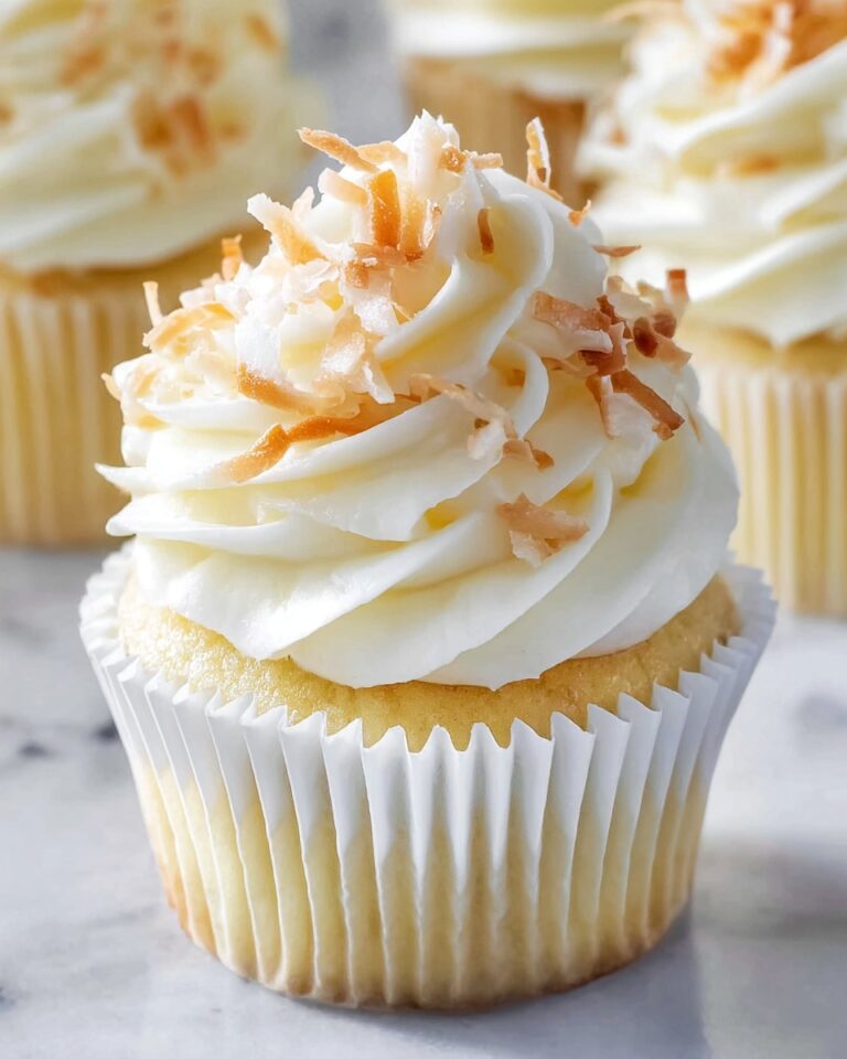 Delicious Coconut Cupcakes with Toasted Coconut and Swiss Meringue Buttercream Recipe