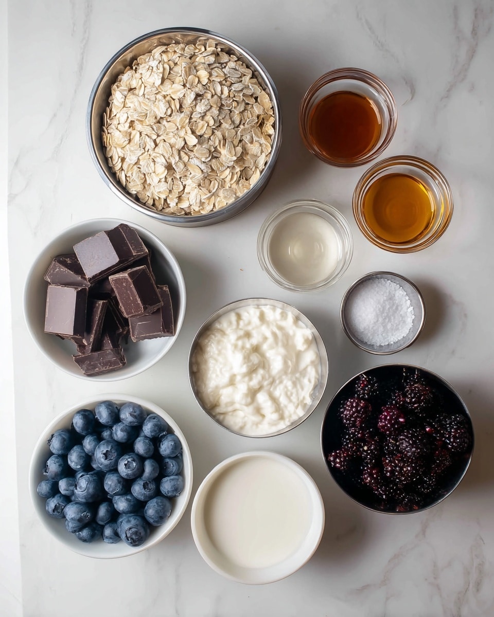 The image shows a top view of nine small containers with different ingredients, placed on a white marbled surface. At the top left, there is a large silver bowl filled with light beige rolled oats. Next to it on the right, two small clear glass bowls hold amber and clear liquids. Below, a metal bowl filled with thick white yogurt sits near the center right. Positioned below the oats, a white bowl contains dark brown chunks of chocolate. To its right, a black metal bowl is filled with dark, frozen mixed berries. On the bottom left, a metal bowl holds white milk, and next to it, a white bowl contains fresh, round blueberries. At the bottom right, another small clear glass bowl contains white salt. Photo taken with an iphone --ar 4:5 --v 7