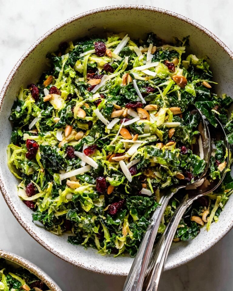Kale Brussels Sprout Salad with Toasted Almonds, Parmesan, and Cranberries Recipe