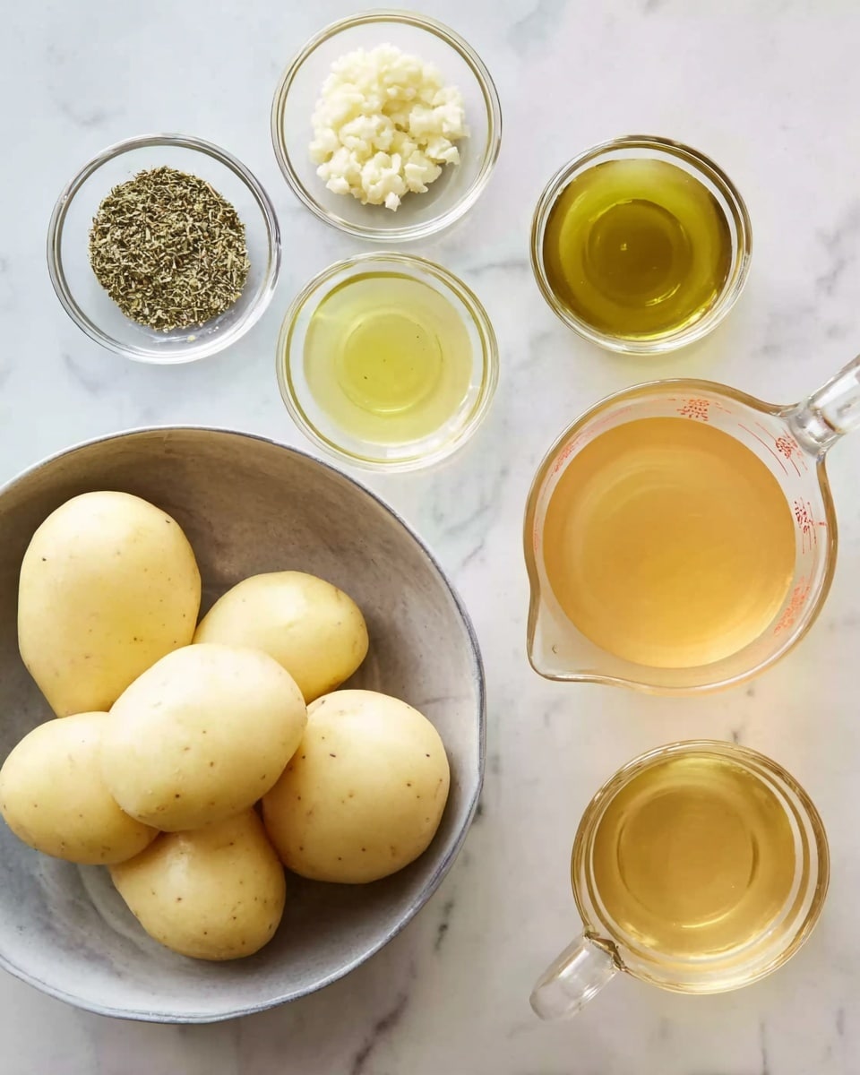 The image shows several ingredients placed on a white marbled surface. In the lower left, there is a metal bowl holding five peeled potatoes that are smooth and light yellow. To the right, two clear glass measuring cups are filled with olive oil and broth, the olive oil being a pale greenish-yellow and the broth a light brown color. In the top center, there are three small clear bowls: one with minced garlic, another with dried herbs, and the last one with salt, each bowl containing light yellow, green, and white contents respectively. The arrangement is neat with each item clearly visible and spaced apart, photo taken with an iphone --ar 4:5 --v 7