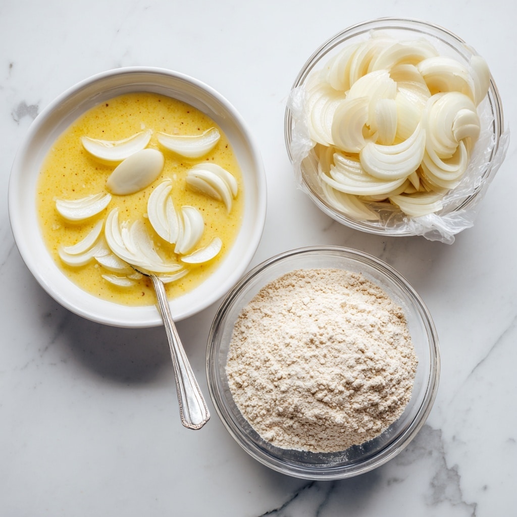 The image shows three bowls on a white marbled surface. The top right bowl contains peeled apple slices, off-white in color, in a crinkled white plastic bag. The bottom right bowl is clear glass filled with fine beige flour, with a few apple slices slightly pressed in. The left bowl is a white plate filled with a yellow liquid batter, with several apple slices dipped inside and a metal spoon resting in the batter. photo taken with an iphone --ar 4:5 --v 7