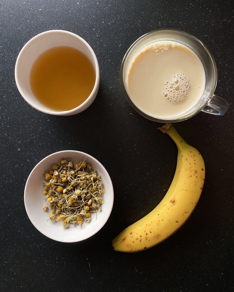 The image shows four separate items arranged on a smooth black surface. On the top left, there is a white bowl containing a light golden yellow liquid with a clear and smooth texture. Next to it on the top right, there is a clear glass mug filled with a creamy beige liquid that has bubbles on the surface. Below the bowl on the bottom left, there is another white bowl holding dried chamomile flowers that are small, round, and pale yellow with some thin brown stems mixed in. On the bottom right, there is a ripe yellow banana with several dark brown spots on its peel. photo taken with an iphone --ar 4:5 --v 7