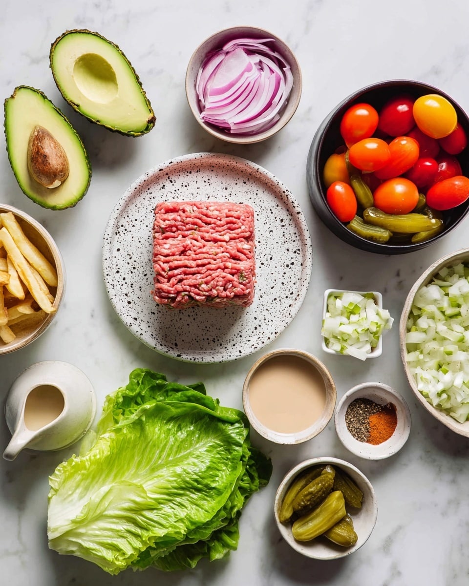 An overhead view of ingredients laid out on a white marbled surface, featuring a square block of raw ground meat on a white plate with black speckles in the center. Around it are layers of bright green leafy lettuce at the bottom center, two halves of a ripe avocado with one containing the pit on the left, thinly sliced purple onions in a small white bowl, and chopped white onions in a speckled white bowl below. On the top right, a black bowl holds red and orange halved cherry tomatoes, with a beige bowl of green pickle slices nearby. At the bottom right, a white bowl contains pale yellow French fries. Three small white bowls with different spices and a small jug with a light brown liquid are also arranged around. A small dish of creamy sauce sits near the lettuce. photo taken with an iphone --ar 4:5 --v 7