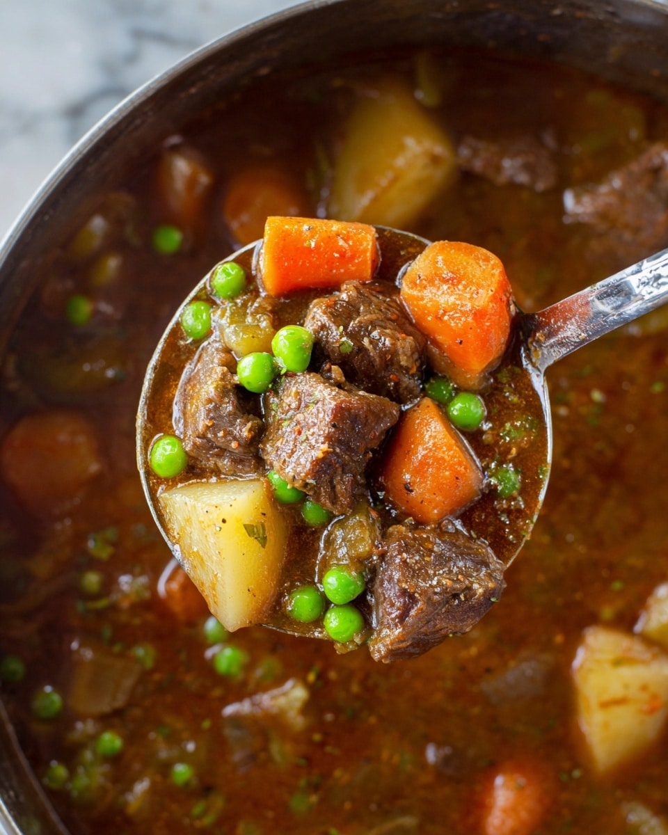 A close-up view of a ladle filled with homemade beef stew, held above a pot of rich brown broth. The ladle contains several layers: at the base, tender chunks of dark brown beef with visible seasoning; scattered around are bright green peas adding pops of color; thick slices of orange carrot and pale yellow potato pieces create a warm contrast; bits of translucent light green celery add texture, all immersed in a shiny, thick brown gravy that fills the ladle and the pot beneath. The background shows more stew with floating vegetables on a white marbled surface. Photo taken with an iphone --ar 4:5 --v 7
