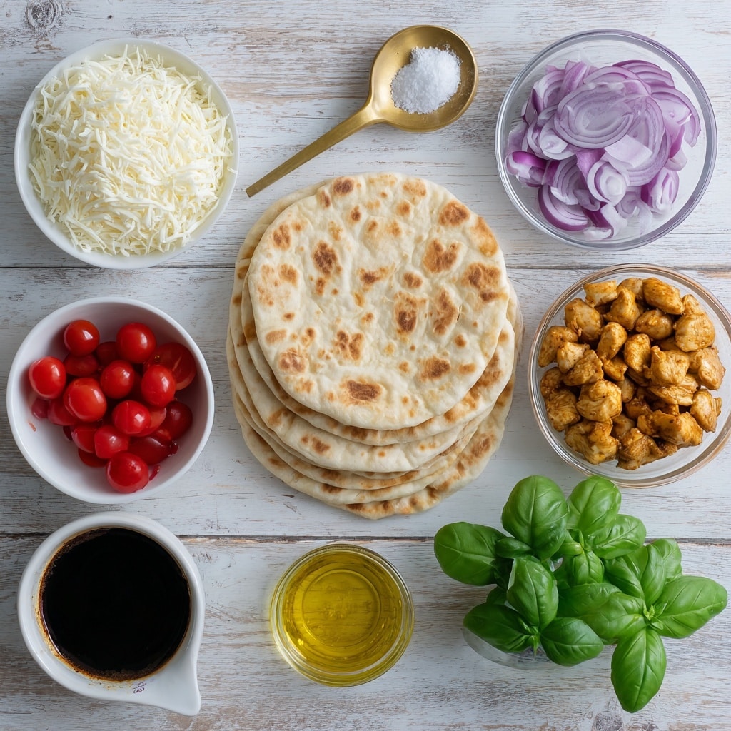 The image shows ingredients arranged neatly on a wooden table with a white marbled texture in the background. At the center, there is a stack of three whole pita rounds with a light brown color and soft texture. Surrounding it, there is a white bowl with shredded white mozzarella cheese on the top left, a white bowl with bright red cherry tomatoes cut in half on the bottom left, and a small white cup with golden olive oil below the pita rounds. To the right, there is a clear glass bowl filled with cooked chicken pieces seasoned with a golden brown color, a clear glass bowl with thin slices of purple-red onion below it, and a small bunch of fresh green basil leaves next to the chicken. Above the pita rounds on the left is a small gold spoon with flaky white salt, and below it is a gold measuring cup with thick dark balsamic glaze. The overall look is clean and organized, showing fresh and colorful ingredients for a meal. Photo taken with an iphone --ar 4:5 --v 7