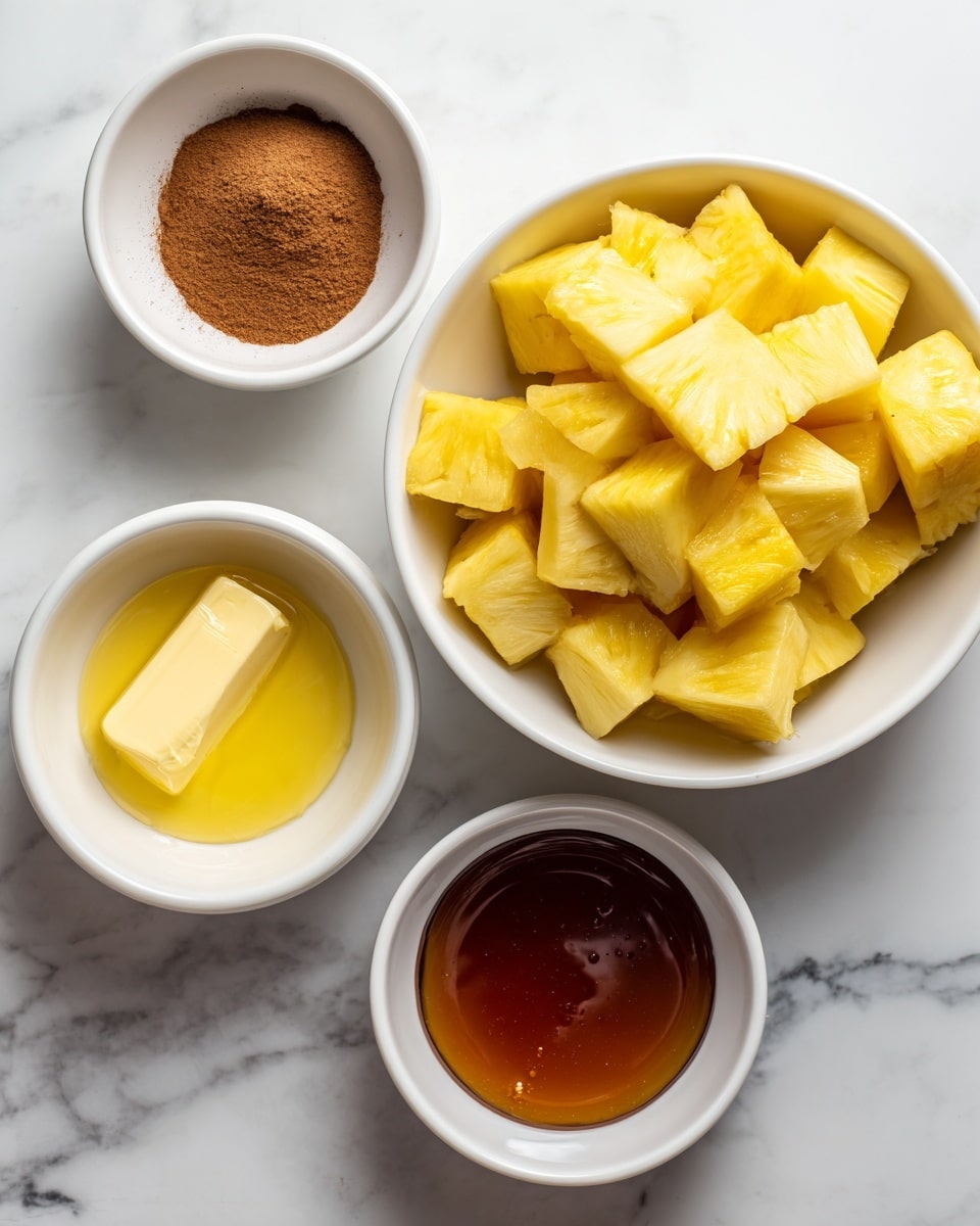 The image shows four white bowls on a white marbled surface. The largest bowl on the right is filled with many pieces of bright yellow pineapple, cut into thick triangular slices and stacked loosely. To the left side, there are three smaller white bowls: the top one contains a fine brown powder labeled cinnamon; below it, there is a bowl with melted yellow butter, smooth and glossy; the bottom bowl holds a thick, amber-colored maple syrup with a shiny surface. Each bowl is neatly placed with clear labels next to them. Photo taken with an iphone --ar 4:5 --v 7