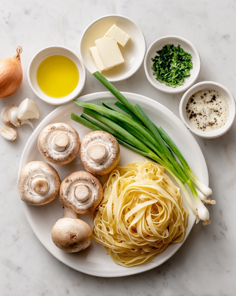A white plate holds four whole beige mushrooms arranged near the top left, with three fresh green scallions laying diagonally across the middle of the plate. To the right of the scallions is a pile of dry yellow flat pasta noodles. Around the plate on a white marbled background are small white bowls containing light yellow butter, pale yellow olive oil, finely chopped green parsley, white truffle salt with black specks, thick white cream, and light yellow truffle oil. In the bottom left corner, a whole light brown shallot and four peeled garlic cloves lay directly on the marble surface. photo taken with an iphone --ar 4:5 --v 7
