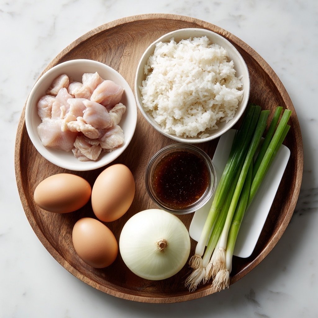 The image shows a round wooden tray on a white marbled surface holding six groups of ingredients in separate white bowls or plates. At the top center, there is a white bowl filled with steamed white rice with a soft, fluffy texture. To the left of the rice bowl, a smaller white bowl contains raw chicken pieces in light pink color. Below the chicken bowl, two brown eggs are placed next to each other on the tray with smooth shells. In the middle of the tray, there is a whole, round white onion with smooth skin. To the right of the onion, a small clear glass bowl holds a dark brown oyakodon sauce with a glossy surface. On the far right, a small white rectangular plate displays three fresh green onions with long, slender green stalks and white roots. The whole setup is neat and clearly arranged for cooking preparation, photo taken with an iphone --ar 4:5 --v 7