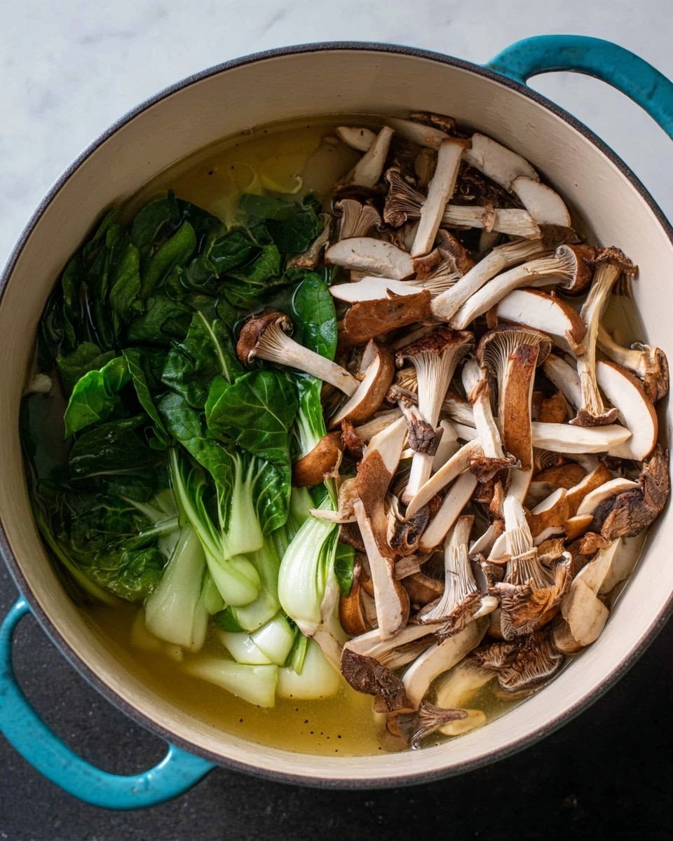A white pot filled with three main layers: the bottom layer shows a clear light golden broth, the middle layer is dark green leafy bok choy arranged neatly on one side, and the top layer is a large pile of thinly sliced brown and white shiitake mushrooms scattered over the greens and broth. The pot has a blue outer edge, and the setting is a white marbled surface. photo taken with an iphone --ar 4:5 --v 7