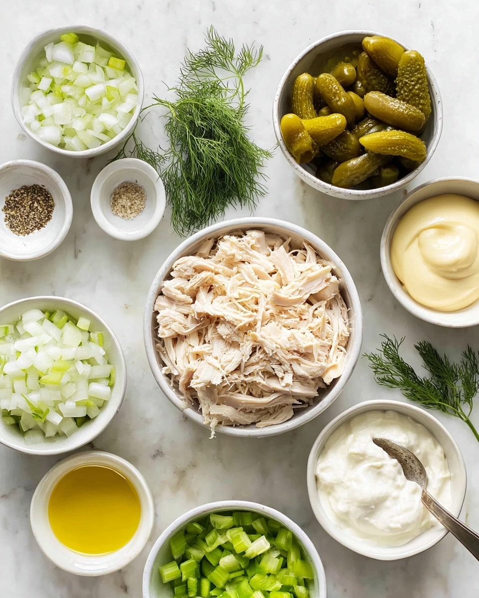 A top view of several white bowls arranged on a white marbled surface, each holding different ingredients: one bowl with shredded light beige chicken in the bottom center, two bowls with chopped white onions and green pickles on the left and right sides, a bowl with fresh green dill in the center, a bowl with light green diced celery near the top right, a bowl with creamy white yogurt or sour cream at top right with a spoon inside, a small bowl with pale yellow mayonnaise below a small white bowl filled with yellow olive oil, and another small white bowl with a mix of white and light brown spices near the center. Small pieces of dill are scattered on the surface around the bowls photo taken with an iphone --ar 4:5 --v 7