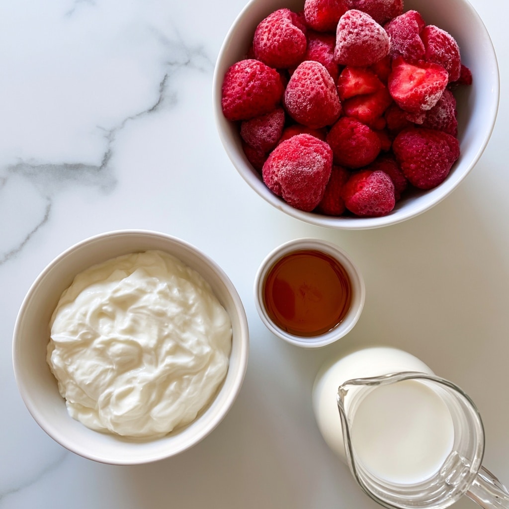 A top-down view shows four separate containers placed on a white marbled surface. In the upper right, a white bowl is filled with bright red frozen strawberries, some whole and some sliced, with a frosty texture. Below and to the left, a white bowl holds thick, creamy greek yogurt with a smooth surface. To the right of the yogurt, a small white cup contains amber-colored maple syrup with a shiny liquid texture. At the bottom right, a clear glass pitcher filled with white milk completes the arrangement. The scene is bright and clean, emphasizing the fresh and natural look of the ingredients photo taken with an iphone --ar 4:5 --v 7