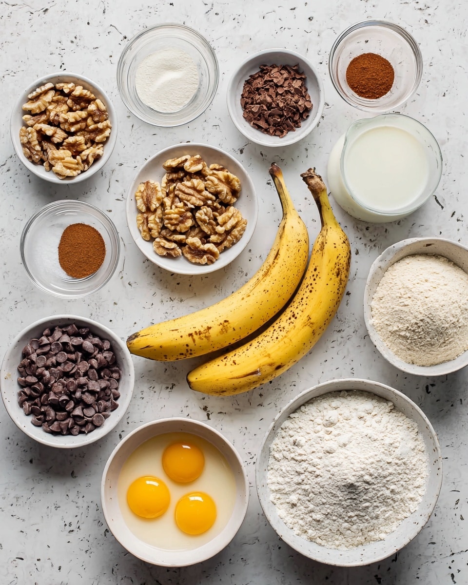 The image shows many baking ingredients on a white marbled surface. There are two yellow bananas with dark spots in the center. Around them are white bowls and small glass cups holding chopped walnuts, brown cinnamon powder, maple syrup, milk in a glass bottle, salt, baking powder, chocolate chips, and flour in two white bowls with rough textures. A white bowl at the bottom holds three raw eggs with bright yellow yolks. All items are spaced evenly with a clean, bright look. Photo taken with an iphone --ar 4:5 --v 7