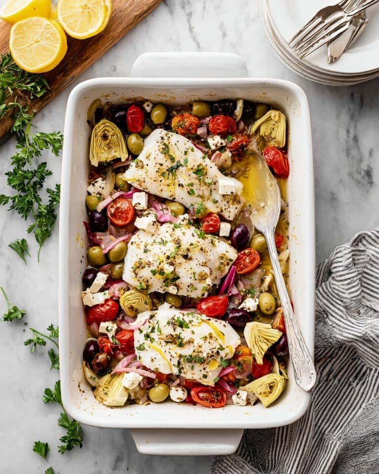 Greek Baked Cod with Cherry Tomatoes, Artichokes, and Feta Recipe