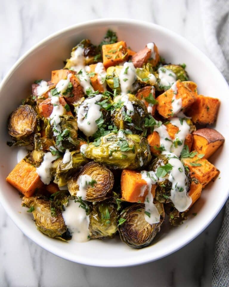 Roasted Brussels Sprouts and Sweet Potatoes with Tahini Sauce Recipe