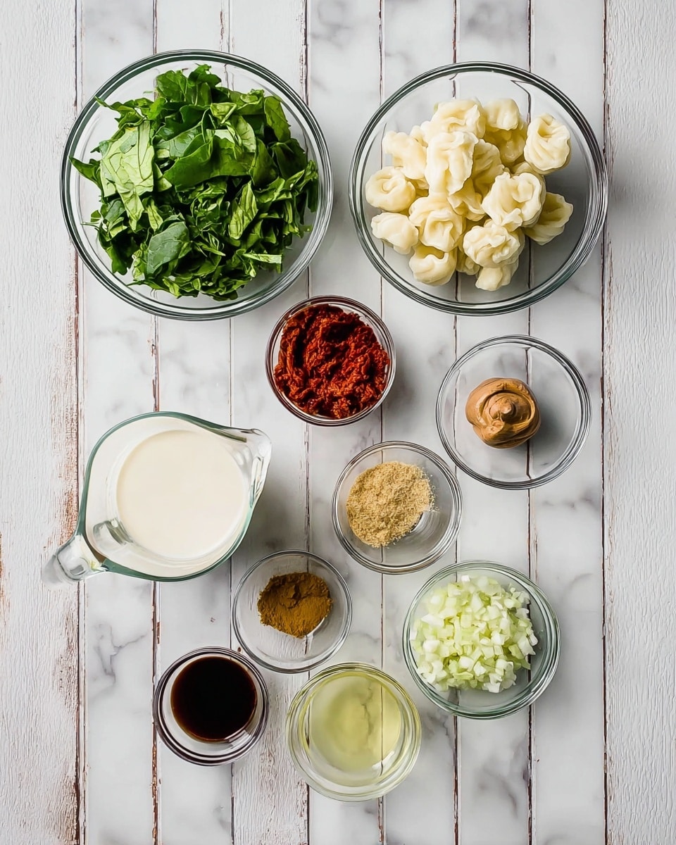 The image shows several clear glass bowls and a small pitcher on a white marbled surface, each holding different ingredients arranged neatly. At the top left is a bowl with chopped leafy green vegetables, and at the top right is a bowl filled with small pale dumplings. Below these, near the center left, is a glass pitcher filled with a white creamy liquid. In the middle row from left to right are small bowls holding a thick light brown paste, a bright red thick paste, and a dark brown liquid. Near the bottom are three small bowls with minced pale yellow garlic, a clear pale yellow liquid, and a golden brown powder with some white granules. The bowls and pitcher create a visually balanced layout. Photo taken with an iphone --ar 4:5 --v 7
