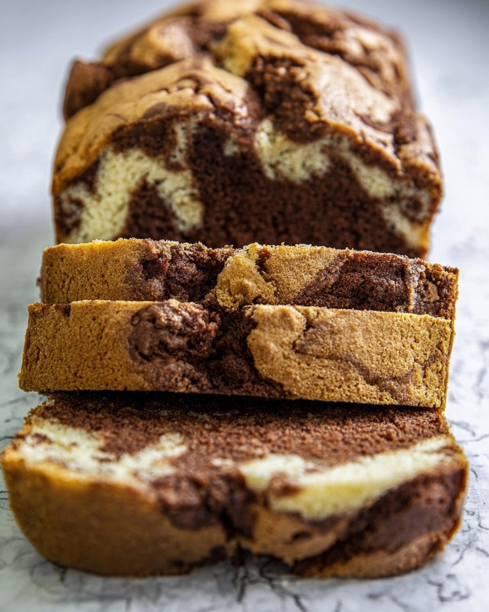 A loaf of marble cake is shown on a white marbled surface, sliced to reveal its inside. The cake has two main layers mixed together: a light brown vanilla layer and a darker brown chocolate layer, creating a swirled pattern. The top crust is cracked and slightly rough, showing a mix of golden brown and darker brown shades. The cake looks soft and moist with visible texture in the layers, and the slices are unevenly stacked in a row. photo taken with an iphone --ar 4:5 --v 7