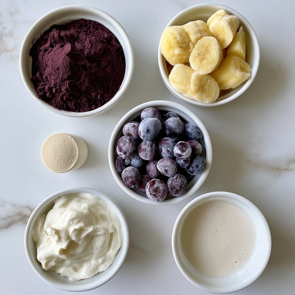 The image shows six small white bowls on a white marbled surface, each with different smoothie ingredients. On the top left is a bowl filled with dark purple acai powder. Next to it on the right is a bowl with frozen banana slices, yellow and frosty. Below, a bowl of frozen blueberries shows deep purple-blue berries covered lightly with frost. Below the acai powder is a small round scoop of light beige protein powder. The bottom left holds a bowl of white creamy Greek yogurt with a smooth texture. On the bottom right, there is a bowl of light-colored milk of choice, slightly creamy in appearance. Each ingredient is clearly separated and labeled. Photo taken with an iphone --ar 4:5 --v 7